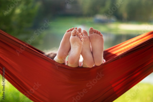 children's feet in a hammock