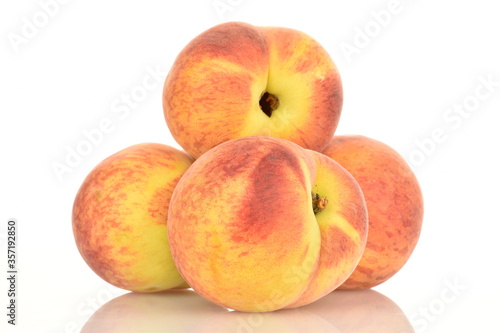 Ripe organic peach, close-up, on a white background
