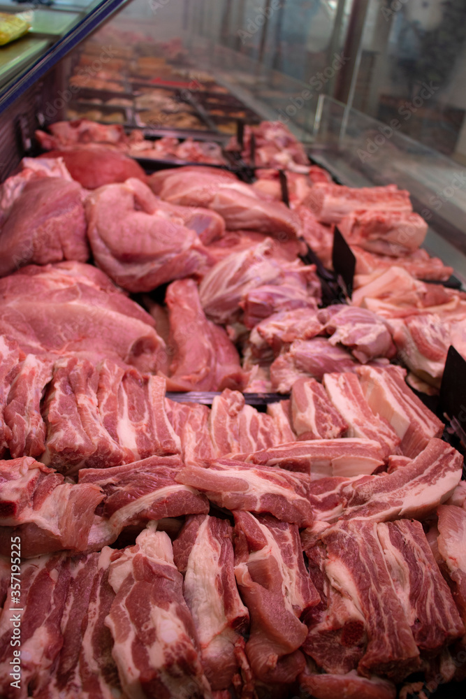 Showcase of a butcher's shop. Close-up. Pork.  Fresh.