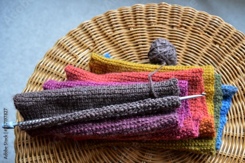 Crochet wool rainbow scarf and hook