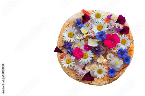 Creative pizza covered with colorful flowers.