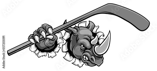 A rhino ice hockey player animal sports mascot holding a hockey stick