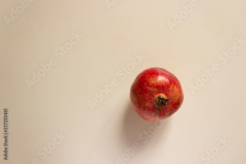 Pomegranate isolated on background. Fresh fruit.