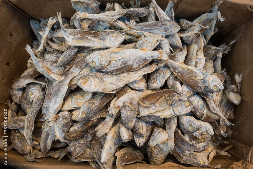 Close up of salted fish, mostly sweet water java barb are sold on the traditional weekly market in the small town Pangururan on the island of Samosir on Sumatra