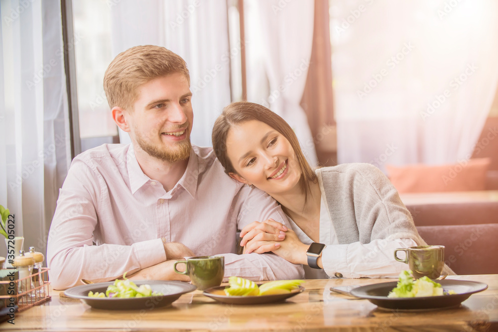 couple in love in a cafe on a date couple in love in a cafe on a date