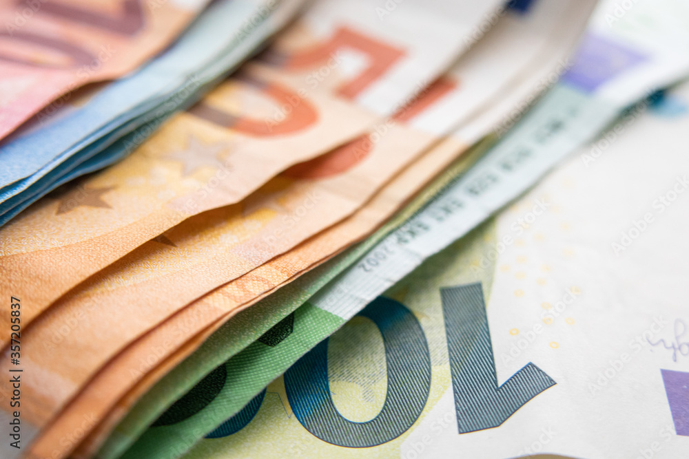 Obraz premium European currency money euro banknotes, credits, leasing. Saving money and banking business concept of financing or bankruptcy