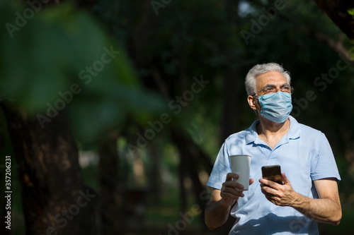 Photography Senior man using mobile phone