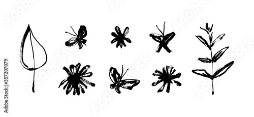 Grunge dirty decorative elements with flowers and butterflies isolated on white background. Hand drawn black vector collection, modern ink graphic art, expressive brush strokes
