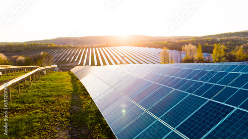 Solar panel cell on dramatic sunset sky background,clean Alternative power energy concept.