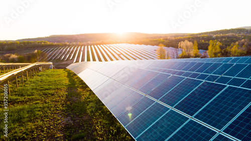 Solar panels (solar cell) in solar farm with sun lighting to create the clean electric power