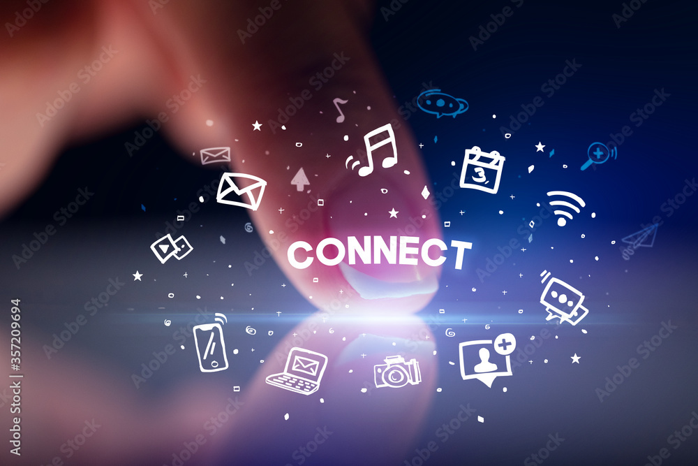 Finger touching tablet with drawn social media icons and CONNECT inscription, social networking concept