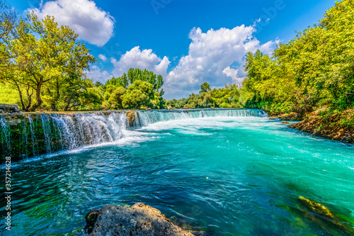 Fototapeta Naklejka Na Ścianę i Meble -  Manavgat Waterfall in Turkey. It is very popular tourist attraction.