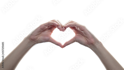 Woman holding hands in heart shape  a sign of love on white isolated background.