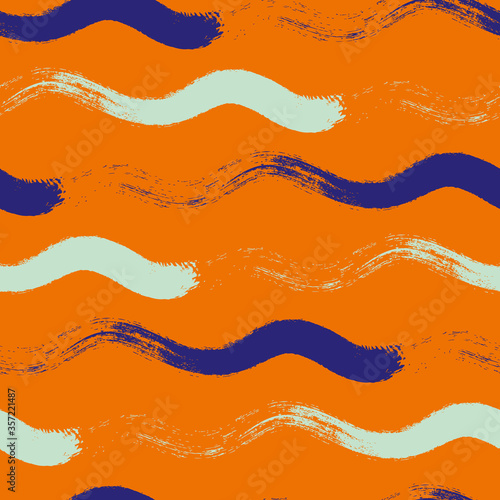 Wavy line seamless vector pattern background. Hand drawn coarse brush stroke horizontal flowing wave. Neon orange blue backdrop. Modern linear geometric stripe. All over print for texture, packaging.
