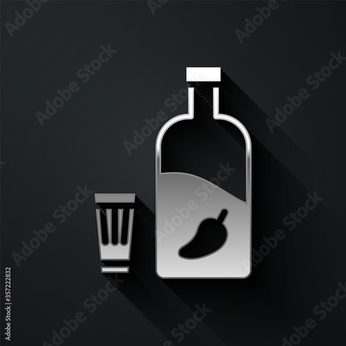 Silver Vodka with pepper and glass icon isolated on black background. Ukrainian national alcohol. Long shadow style. Vector Illustration.