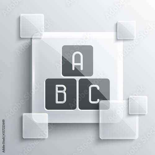 Grey ABC blocks icon isolated on grey background. Alphabet cubes with letters A,B,C. Square glass panels. Vector Illustration.