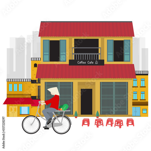 Vietnamese man and bicycle in town