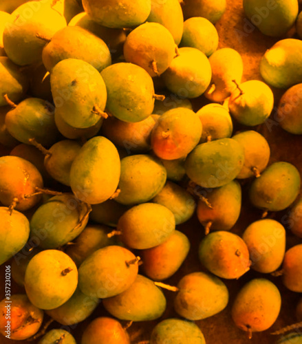 Photography Fresh Colorful Mangoes at Outdoor Fruit Market stock photos