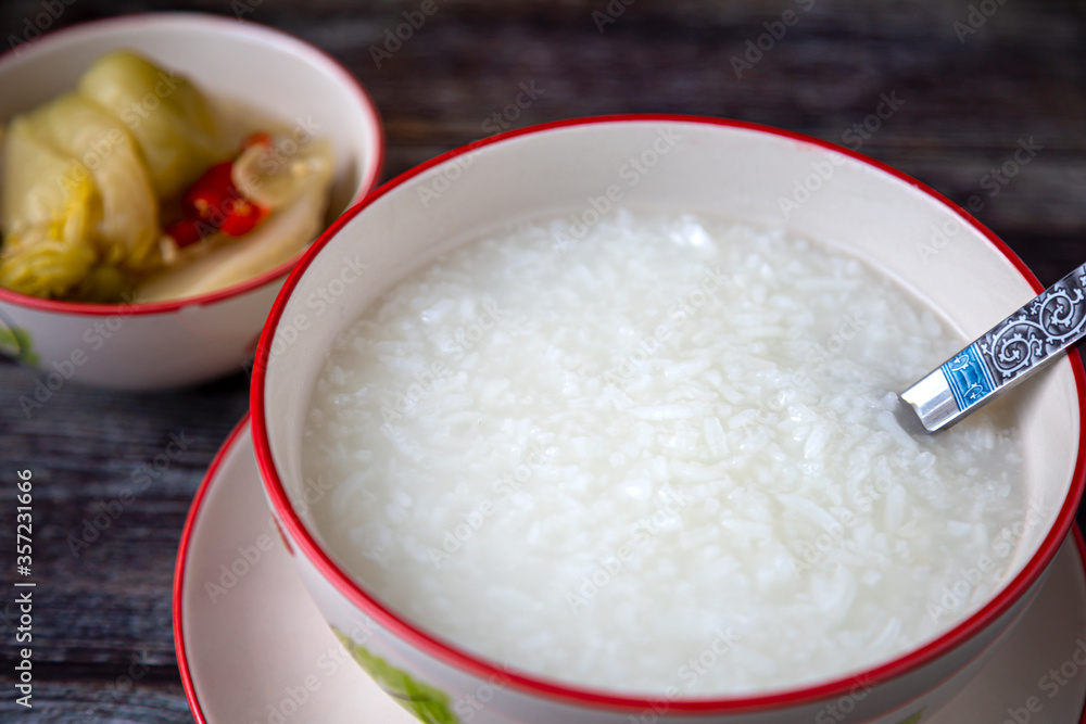 Porridge in a bowl and pickled cabbage for breakfast
Porridge in a bowl and pickled cabbage for breakfast