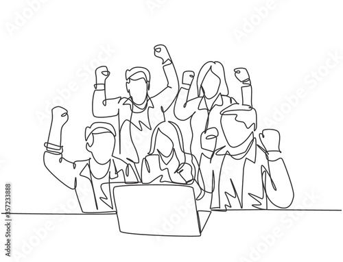 One continuous line drawing of young happy business man and business woman sitting in front of laptop and celebrating their success. Team work goal concept single line draw design vector illustration