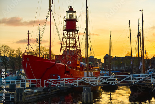 Willemsoord, Den Helder, the Netherlands - May 2020. Old lightship at the former shipyard Willemsoord in the port of Den Helder  photo