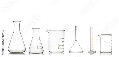 Group of laboratory glassware with reflection isolated on white background.