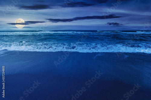 Stampa su tela beach and sea on a cloudy night