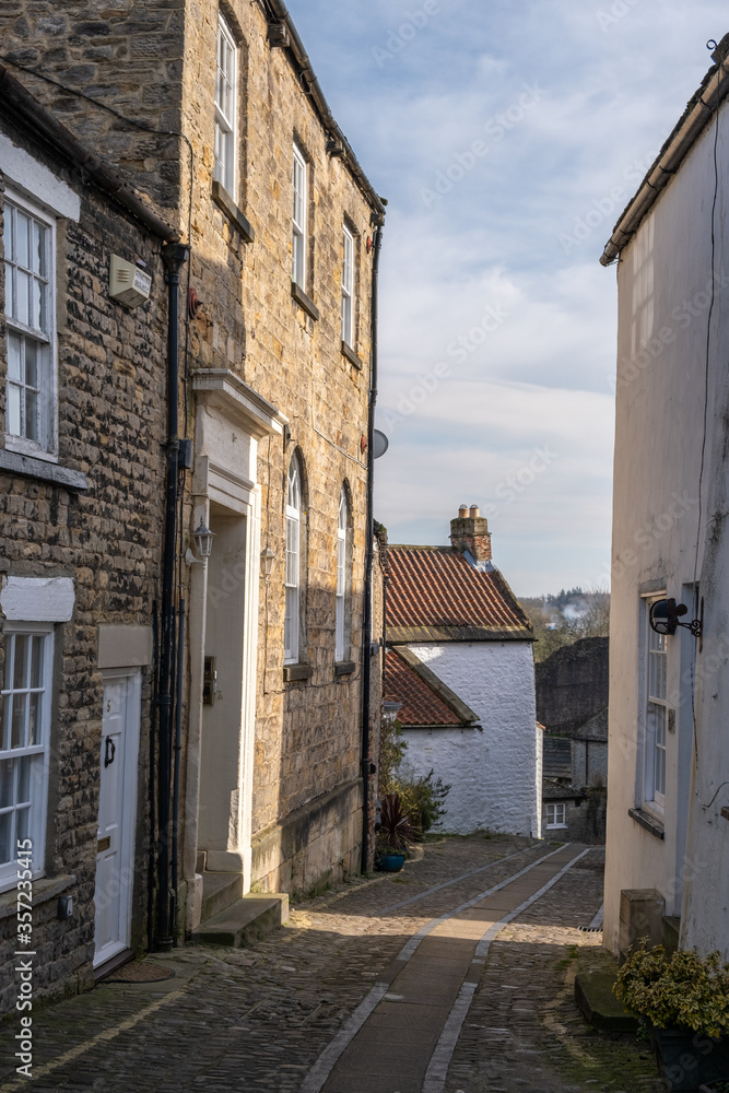 A view down a pretty cobbled side street in Richmond, North Yorkshire