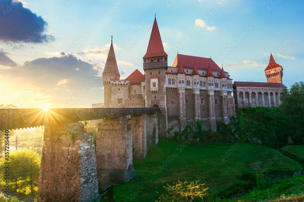 legendary corvins castle in hunedoara at sunrise. one of the largest in europe and is in a list of seven wonders of romania. most visited travel destination of transylvania