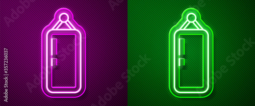 Glowing neon line Punching bag icon isolated on purple and green background. Vector Illustration.
