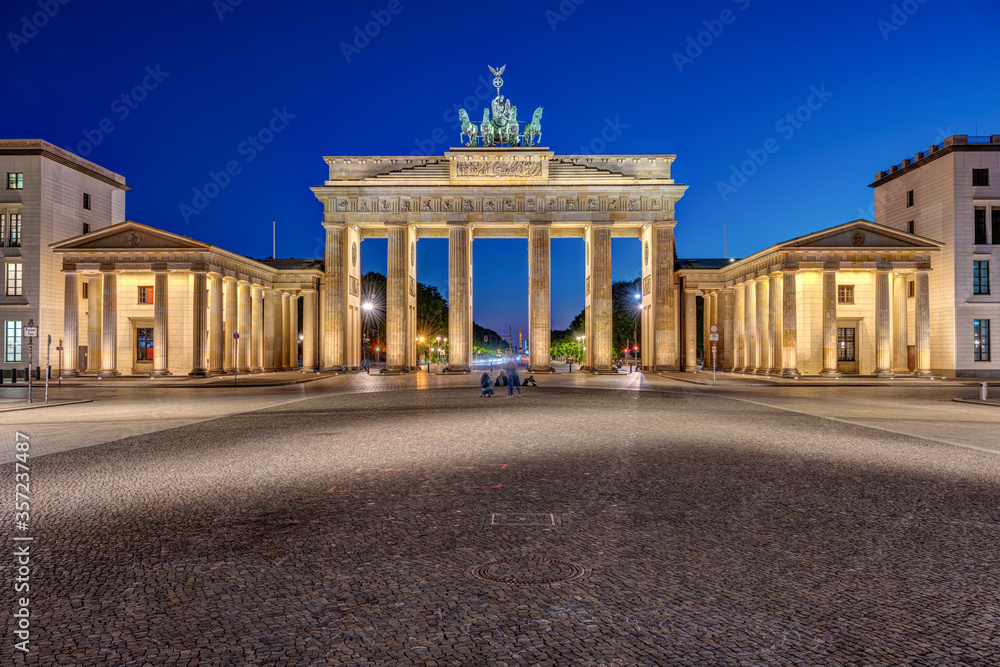 The famous illuminated Brandenburg Gate in Berlin at night with no people