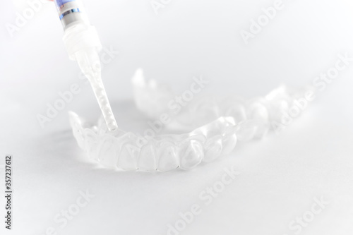 Teeth tray for dental whitening opalescence and bleaching gel syringe