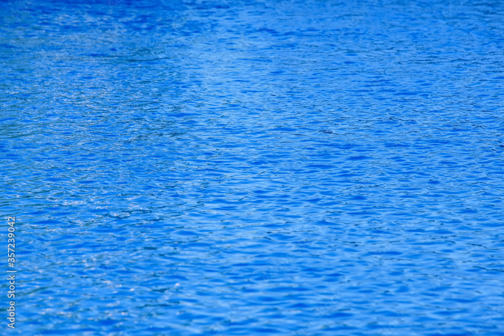 Fototapeta premium Blue water surface for background