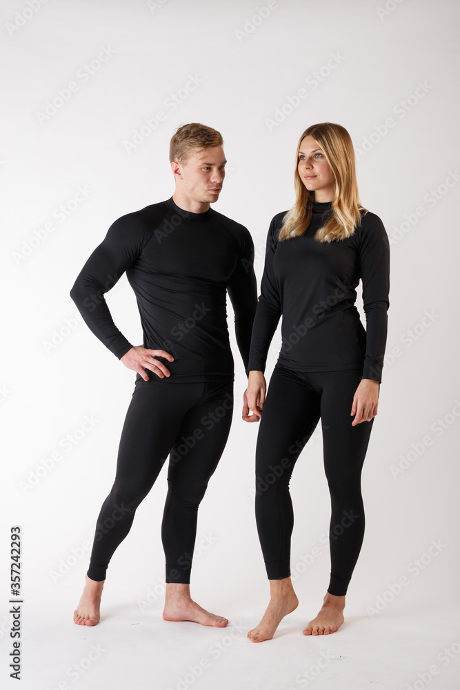 Guy and girl in thermal underwear on a white background Guy and girl in thermal underwear on a white background
