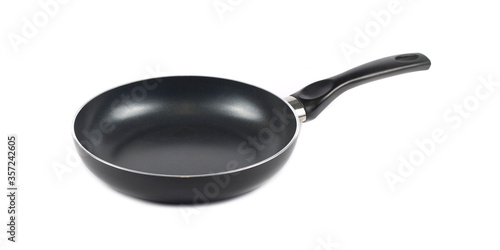 Canvas Print Metal black frying pan with a non stick coating composition isolated over the wh
