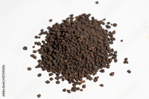 Dried Tea Leaves powder With White Background