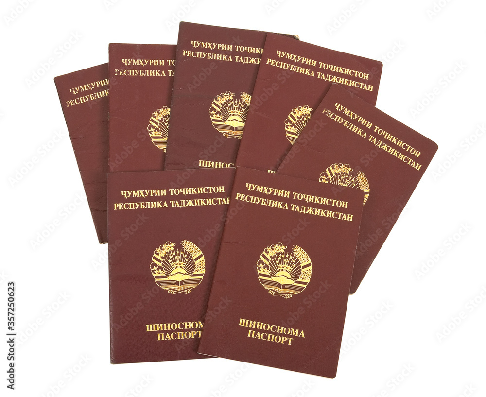 Naklejka premium Tajikistan passports on white background