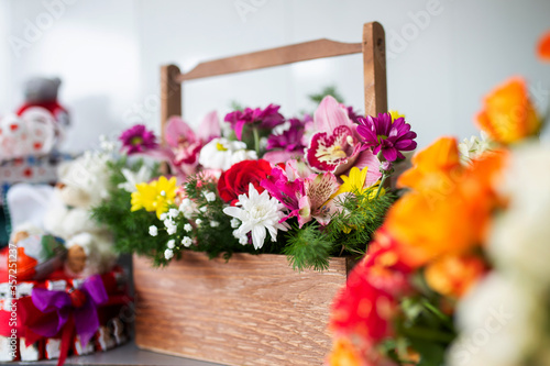 Wallpaper Mural bouquet of flowers in a wooden box. beautiful gift for the holiday Torontodigital.ca
