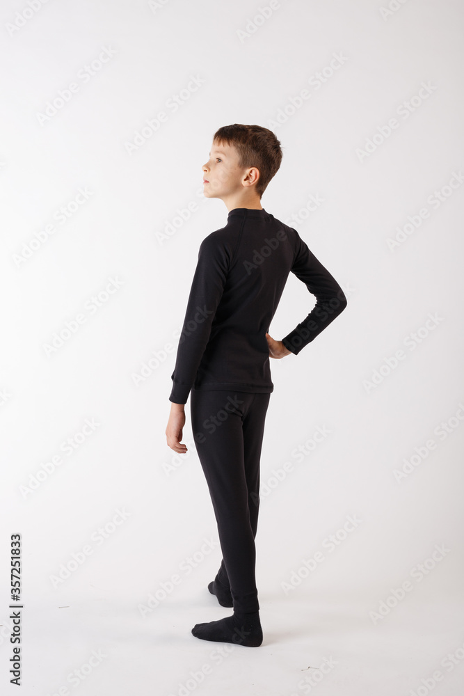 Boy in thermal underwear on a white background. Sportswear. Boy in thermal underwear on a white background. Sportswear.