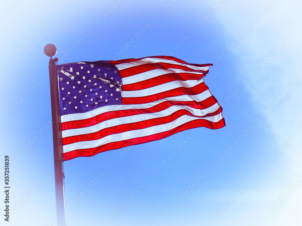 Fototapeta premium American flag waving in the wind