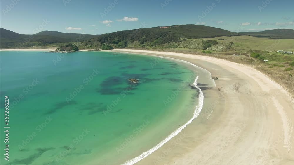 Aerial flying over Maitai Bay on the Karikari Peninsula, Northland, New Zealand Aerial flying over Maitai Bay on the Karikari Peninsula, Northland, New Zealand