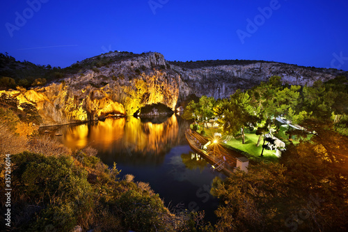 Night view of Vouliagmeni lake, ideal place for relaxation and wellness treatment close to Athens, Attica, Greece.