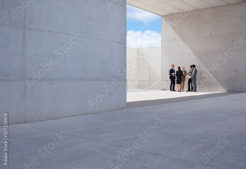 Fotografie Business people meeting outside modern building
