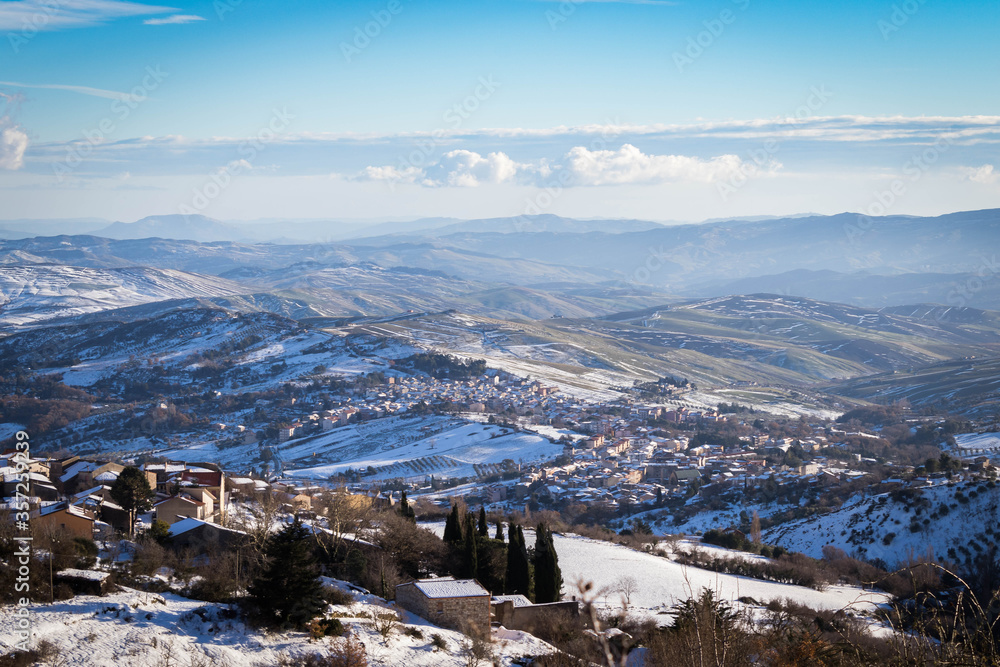 Panorama of Castellana Sicula covered in snow in the Madonie Park