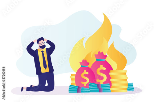 Upset businessman kneeling. Finances are burning up. Global financial crisis, inflation. Bankruptcy concept.
