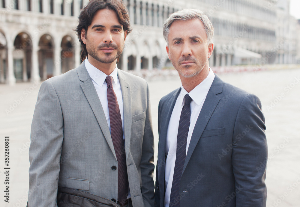 Portrait of confident businessmen in St. Mark's Square in Venice Portrait of confident businessmen in St. Mark's Square in Venice