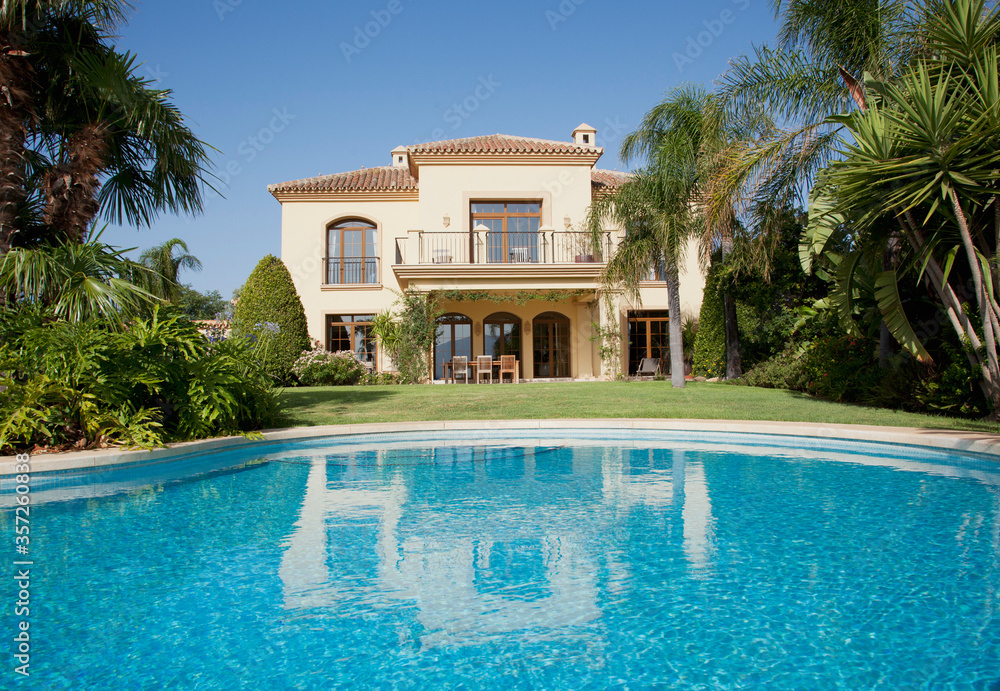 Luxury swimming pool and Spanish villa