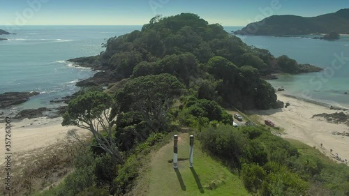 Aerial flying over Maitai Bay on the Karikari Peninsula, Northland, New Zealand photo