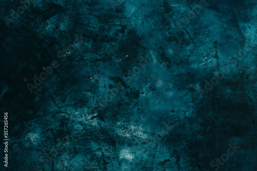 Fototapeta stucco texture, dark blue-green background, banner