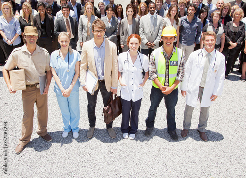 фотографія Portrait of smiling professionals workers with business people